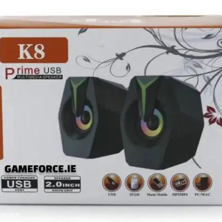 SPEAKER PRIME USB K8 GAMING SPEAKERS showing vibrant RGB lighting and compact design on a gaming desk setup